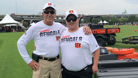 Kenneth and his dad, Paul, at Bengals practice.